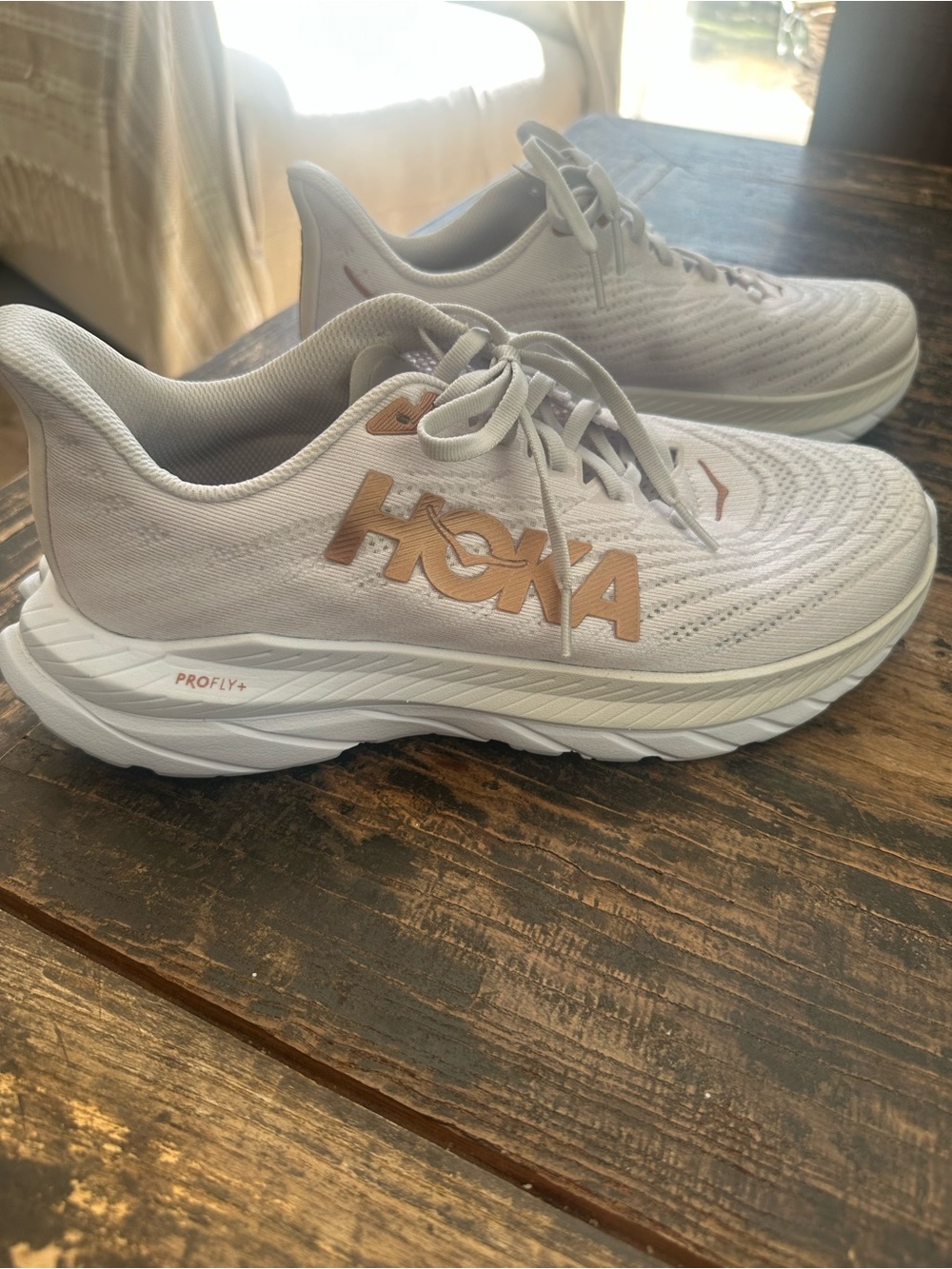 Hoka Women’s ProFly+ White Athletic Shoes with Rose Gold Logo